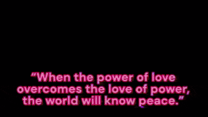 Jimi Hendricks Playing guitar Picture zooms in on his face With a white background And then changes to a film strip With different pictures of hendrix Overlaid with his Lyrics' When the power of love overcomes the love of power The world will know peace'