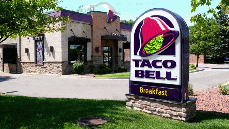 A Taco Bell sign is in the background. A head of lettuce rolls out of the bell on the sign, rolls into the grass, and turns into a pile of poop shaped like Donald Trump. As this happens, text appears saying, 'Trump-arrhea: explosive poop, just like they said'. Just before the end, the poop explodes, followed by a couple more explosions behind the sign and in the drive-through.